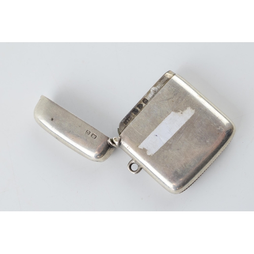 262 - Hallmarked silver vesta case with engraved decoration, 26.1 grams, Chester 1899.