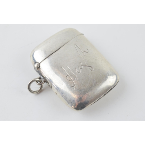 264 - Hallmarked silver vesta case with engraved decoration, 'Hugh', 30.9 grams, Birmingham 1894.