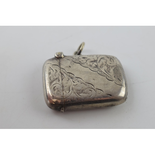 266 - Hallmarked silver vesta case with engraved decoration, 14.7 grams, Birmingham 1907.