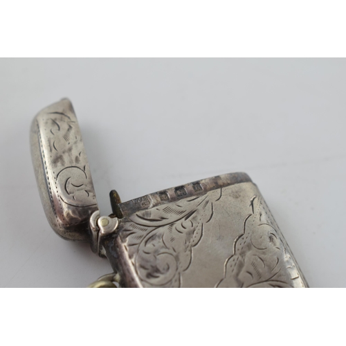 266 - Hallmarked silver vesta case with engraved decoration, 14.7 grams, Birmingham 1907.