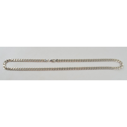 275 - Silver curb link chain with lobster claw clasp marked 925 Italy. Length including clasp 61.5cm. Weig... 