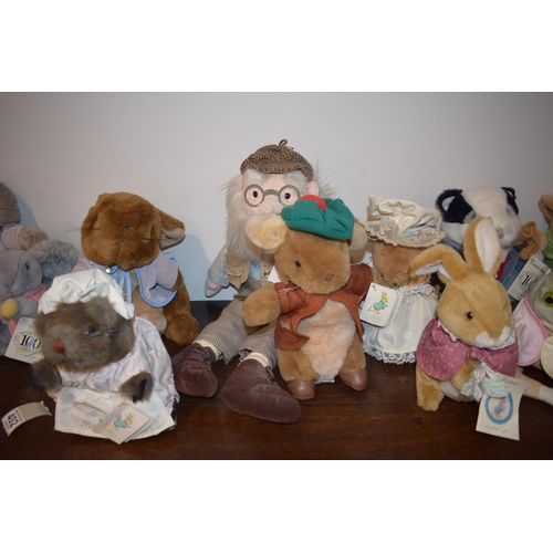 402 - A good collection of Peter Rabbit, F Warne & Co, soft toys to include various characters such as Tom... 