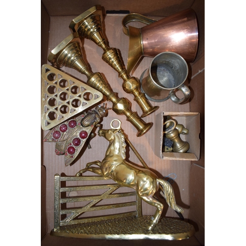 435 - Metalware to include brass jumping horse over a gate, a pair of candlesticks, a trivet, a copper jug... 