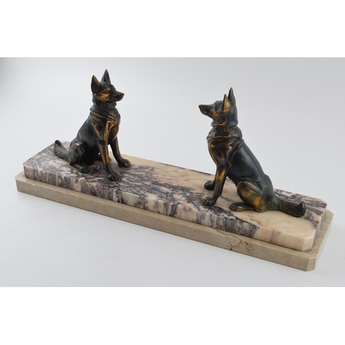 436 - French Art Deco spelter figures consisting of a pair of alsatians, mounted on a marble base, 46cm lo... 