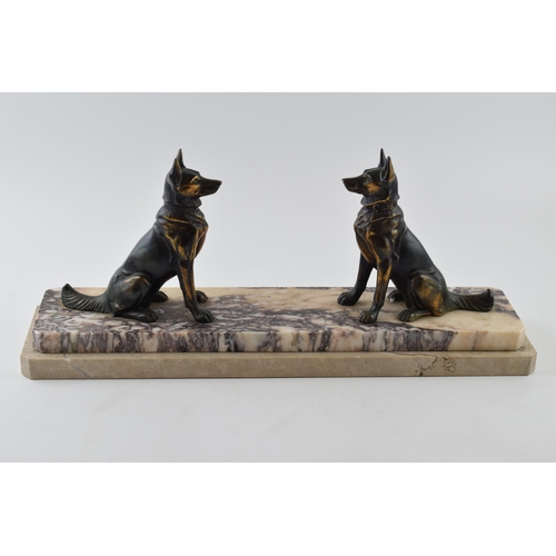 436 - French Art Deco spelter figures consisting of a pair of alsatians, mounted on a marble base, 46cm lo... 