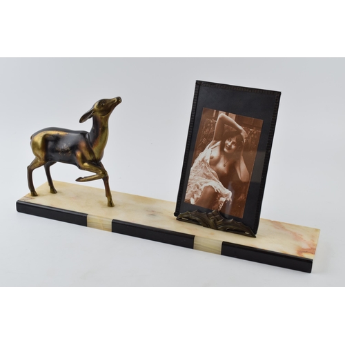 438 - French Art Deco spelter figure of a deer with a photo frame depicting semi erotic scenes, mounted on... 