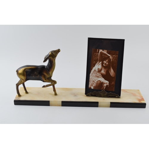 438 - French Art Deco spelter figure of a deer with a photo frame depicting semi erotic scenes, mounted on... 