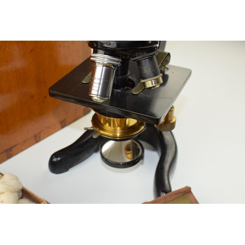 441 - W. Watson & Sons Kima microscope along with assorted microscope slides, a travelling scientific kit ... 