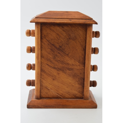 450 - Vintage style perpetual calendar in wooden case with scroll like action, 17cm tall.