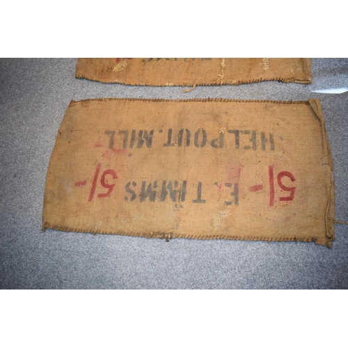 460 - Two vintage corn sacks (red writing) E. TIMMS HELP OUT. MILL 130cm x 70cm (2)