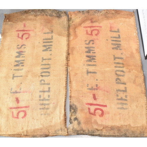 461 - Two vintage corn sacks (red writing) E. TIMMS HELP OUT. MILL 130cm x 70cm (2)