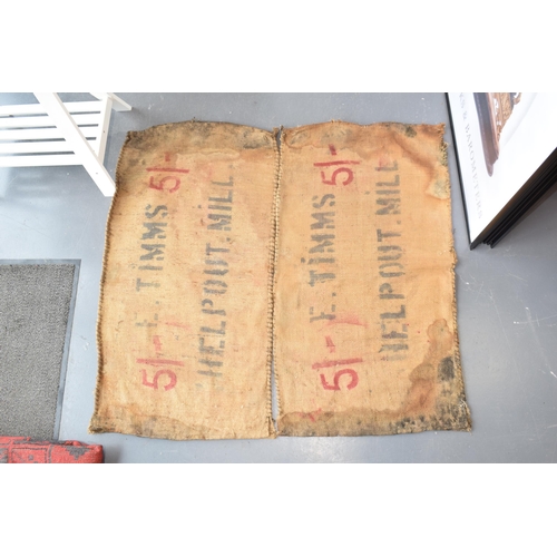 461 - Two vintage corn sacks (red writing) E. TIMMS HELP OUT. MILL 130cm x 70cm (2)