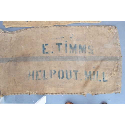 462 - Two vintage corn sacks (blue writing) E. TIMMS HELP OUT. MILL 130cm x 70cm. (2)