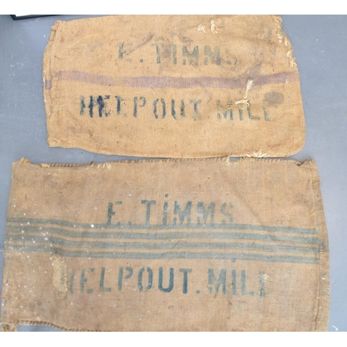 462 - Two vintage corn sacks (blue writing) E. TIMMS HELP OUT. MILL 130cm x 70cm. (2)