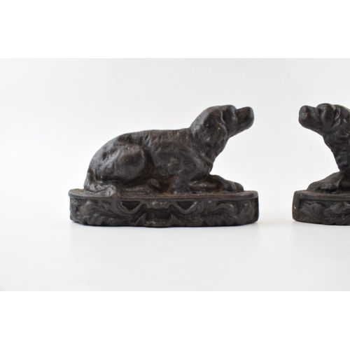 478 - Pair of small antique dog door stops. English, cast iron decorative bookend or doorstopper in Retrie... 