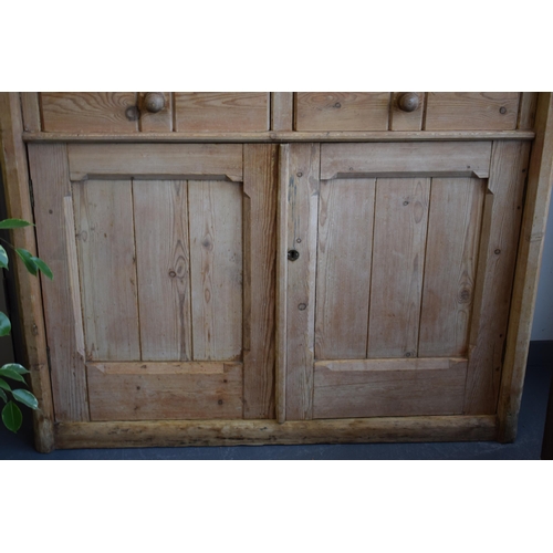 491 - Pine housekeepers cupboard / linen press with dual doors and 2 drawers, 244cm tall, 124cm wide and 3... 