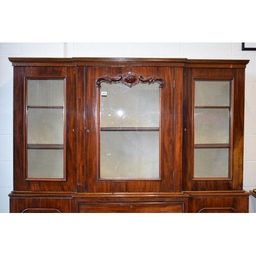 492 - 19th century mahogany breakfront sideboard / glazed bookcase with turned handles and floral carving,... 