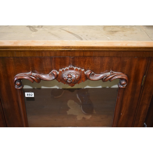 492 - 19th century mahogany breakfront sideboard / glazed bookcase with turned handles and floral carving,... 