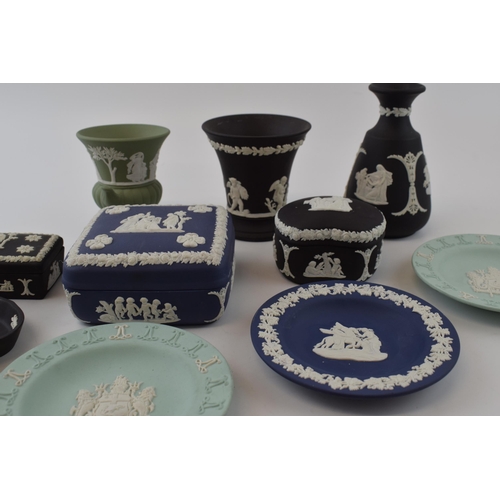 215 - Wedgwood Jasperware vases, lidded pots, bud vases and trinket dishes in colours black, sage green, m... 