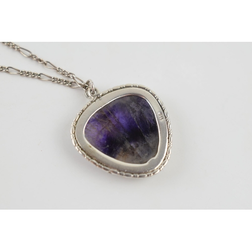 282 - Sterling silver pendant set with Blue John, 25mm tall, on a silver chain, 50cm long.