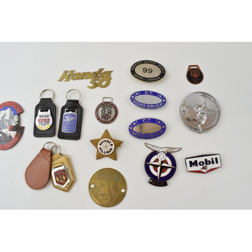 466 - A collection of automobilia badges and similar items to include enamel Grossglockner Hochalpenstrass... 