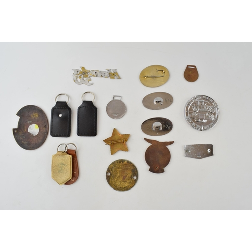 466 - A collection of automobilia badges and similar items to include enamel Grossglockner Hochalpenstrass... 