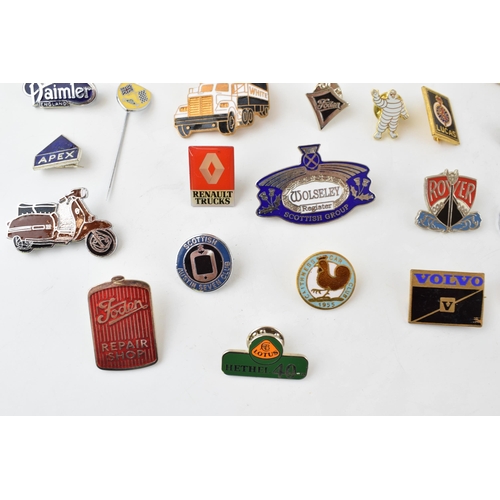 469 - A collection of enamel badges relating to cars and motoring to include Michelin man, Lucas, Guy Moto... 