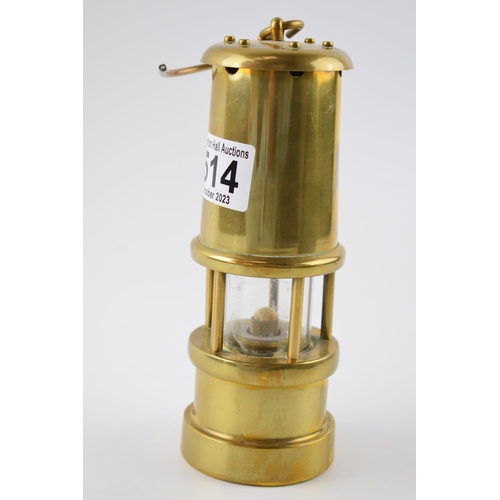 514 - A brass vintage style miners safety lamp. Height 17cm.