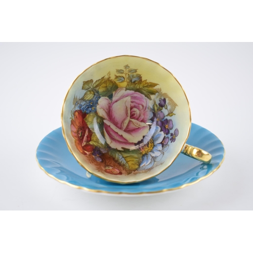 218 - Aynsley cup and saucer in the Pink Rose / Cabbage Rose design, signed by J A Bailey (2).