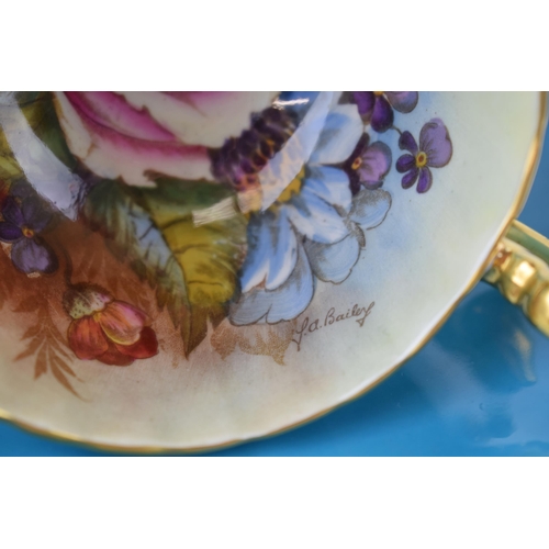 218 - Aynsley cup and saucer in the Pink Rose / Cabbage Rose design, signed by J A Bailey (2).