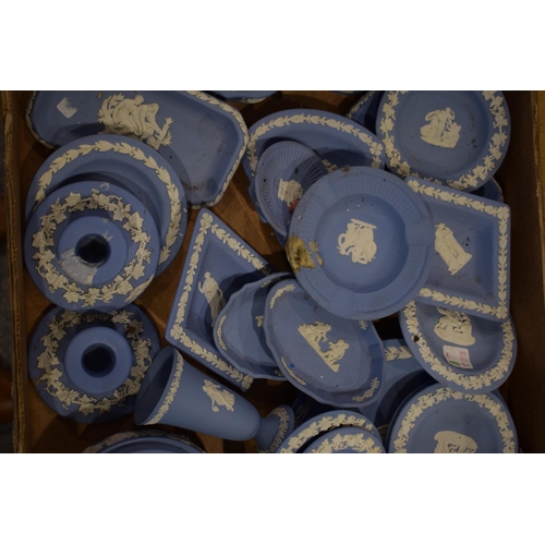 216C - Wedgwood Jasperware to include vases, trinkets, pin dishes, candlesticks and others in blue, circa 2... 