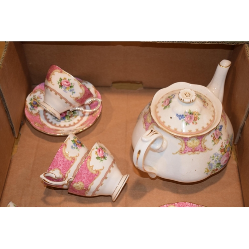 219C - Royal Albert tea ware in the Lady Carlyle pattern to include a teapot, 9 cups, a saucer and side pla... 