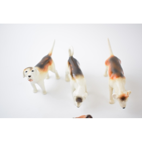 65D - Beswick to include a beagle, 4 various foxhounds and 2 foxes (7).