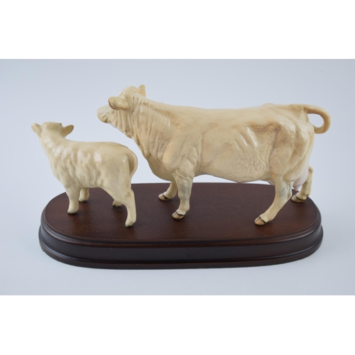 95M - Beswick Charolais Cow and Calf on wooden base.