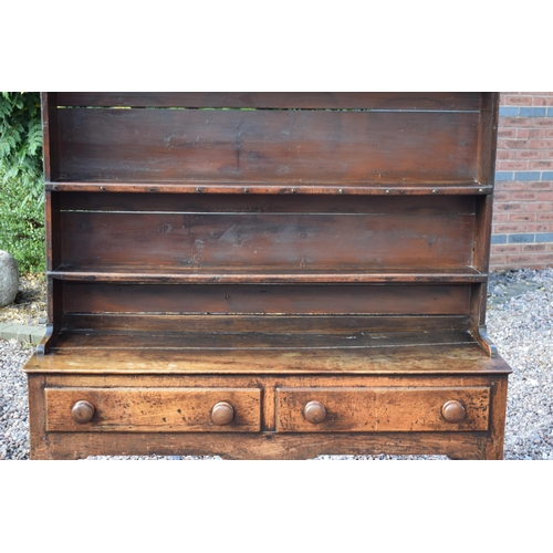 492A - Early 19th century Welsh oak dresser with planked base with 2 drawers with 3 shelf top rack with gro... 