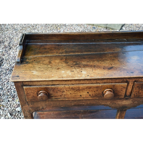 492A - Early 19th century Welsh oak dresser with planked base with 2 drawers with 3 shelf top rack with gro... 