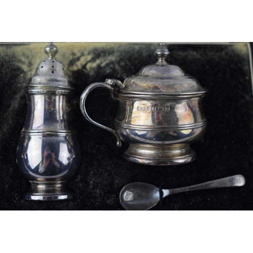 227C - Cased silver cruet set with spoons, Birmingham 1955, 97.2 grams.