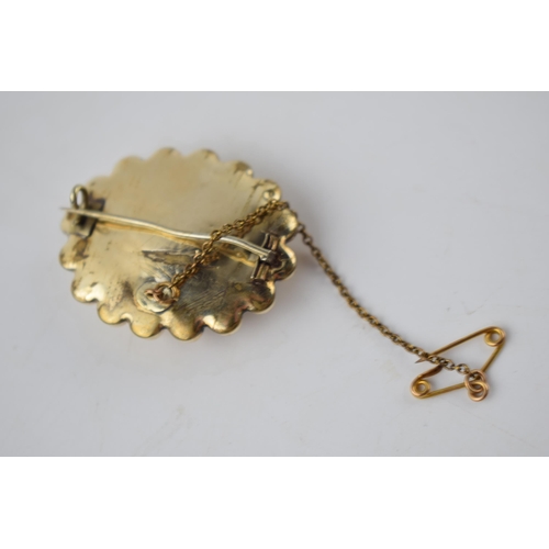 288 - Victorian yellow coloured metal mourning brooch, bauble detail to run, hair to central glazed panel,... 