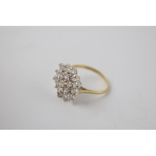 290E - 9ct gold dress ring set with multiple stones, 2.9 grams, size N.