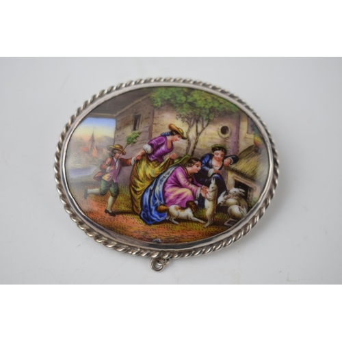 290K - Silver framed porcelain scene of villagers with hares, 60mm wide.