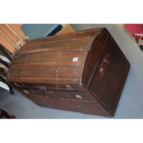 509 - Antique domed top travelling trunk, lined with wall paper, 87cm x 55cm.