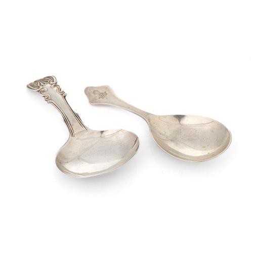 127 - A pair of silver caddy spoons to include London 1916 Wakely & Wheeler, with a Birmingham 1818 John B... 