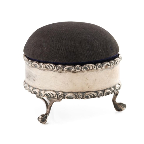 150 - Silver jewellery / pin box, raised on 3 ball and claw feet, padded and raised top, Chester 1912, 7.5... 