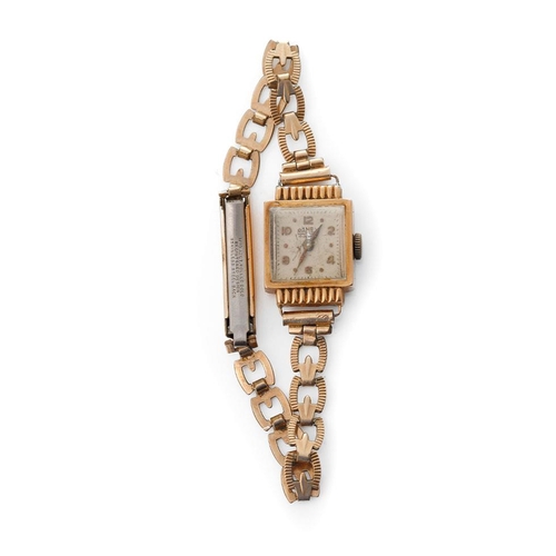 168 - A ladies 18ct gold Ramex cocktail watch. 17 Jewels movement, Marked .750 18K. On a gold plated perio... 