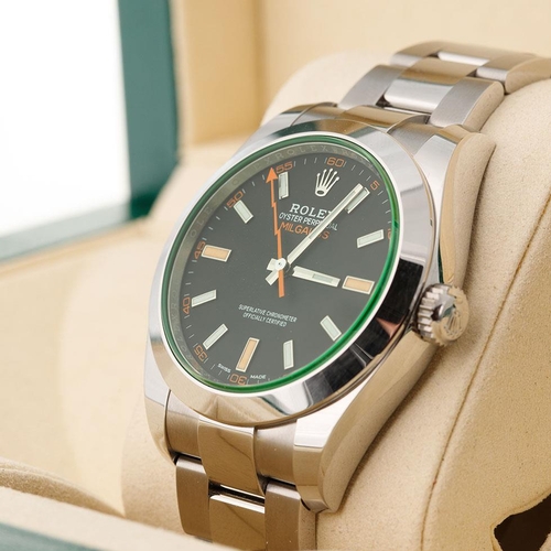 175 - 2021 Rolex Milgaus Ref 116400 GV benefiting from the sought after discontinued green glass. Includes... 