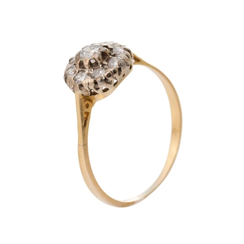 197 - 18ct gold and platinum daisy ring set with diamonds, approximately 0.38 carat of diamonds, UK size T... 