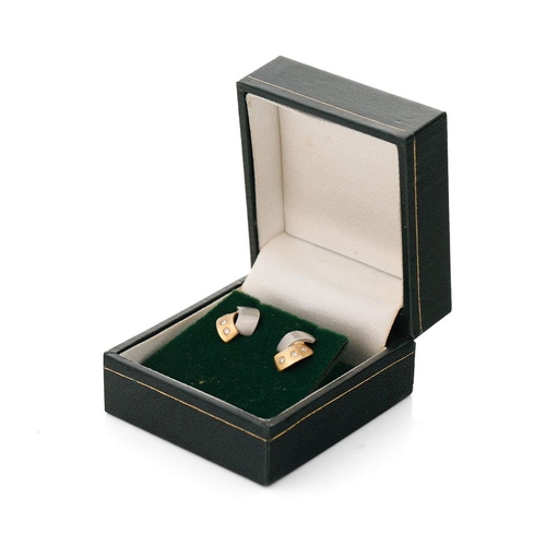 204 - A quality pair of 18ct gold, platinum and diamond earrings, 3.1 grams.