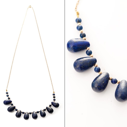 210 - 9ct gold necklace with lapis lazuli beads with 9ct beads inbetween, 55cm wide, gross weight 24.4 gra... 