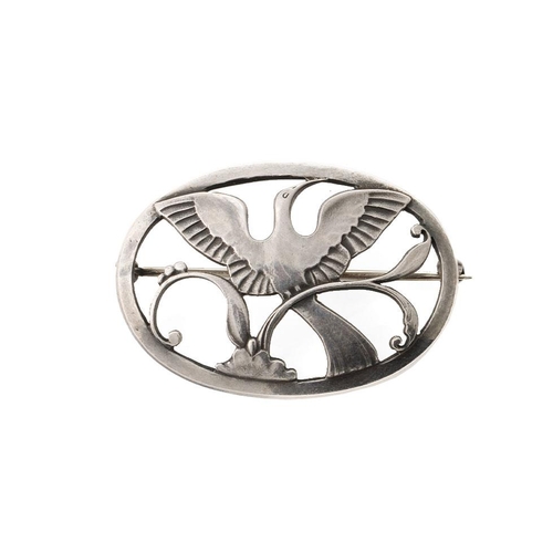 229 - A Georg Jensen silver brooch, designed by Arno Malinowski. 'Bird of Paradise' with stylized leaves w... 