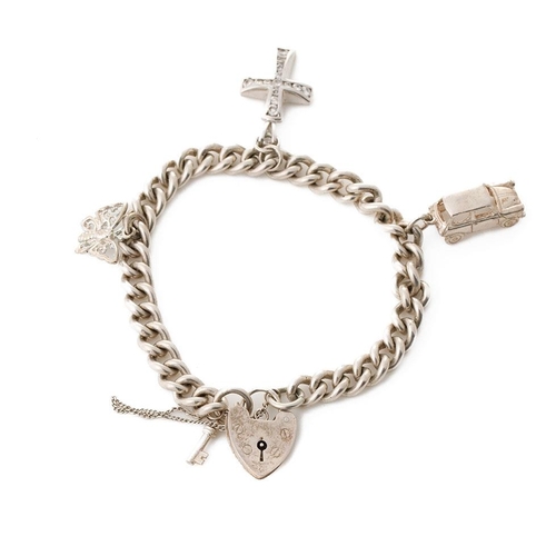 237 - Silver charm bracelet with charms to include a car, a cross and others, 34.7 grams.